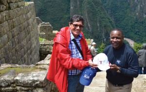 Alejandro Paul Pletickosich Picon (left), director of social responsibility and university extension at Universidad Andina Del Cusco, and MTSU President Sidney A. McPhee exchange university hats Saturday while touring the Inca Empire ruins at Machu Picchu, near Cusco, Peru. (MTSU photo by Andrew Oppmann)
