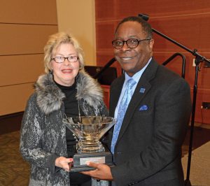 Connie J. Smith, director of Advanc-ED Tennessee, left, presents MTSU President Sidney A. McPhee on Tuesday, March 1, with the organization’s 2016 Leadership in Education Award for his efforts to support STEM (science, technology, engineering and mathematics) learning in primary, secondary and higher education. McPhee received the honor as Advanc-ED Tennessee wrapped up a two-day conference on the MTSU campus Tuesday that attracted hundreds of public, private and parochial educators, school board members, superintendents and principals to learn and reflect on ways to best extend STEM education. (MTSU Photo)