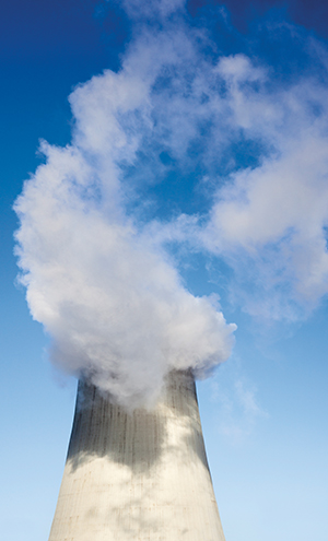 Cooling tower of the power plant in Kyiv (Ukraine) with water vapor over it.